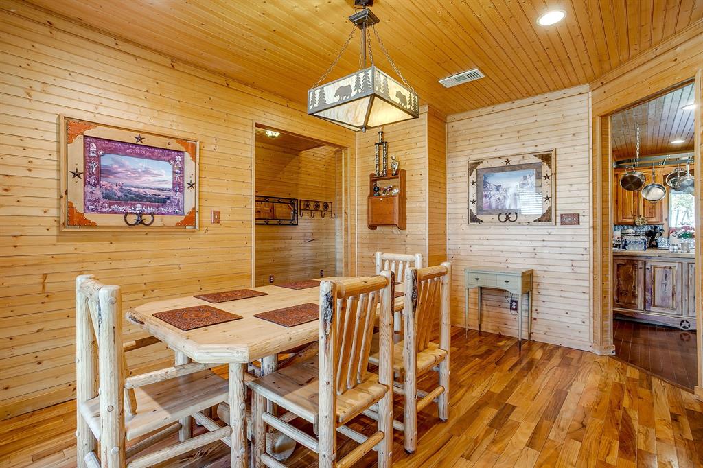1791 Farm To Market Road 730 North Decatur, TX 76234 - Photo 19 of 40 a view of a dining room with furniture and wooden floor