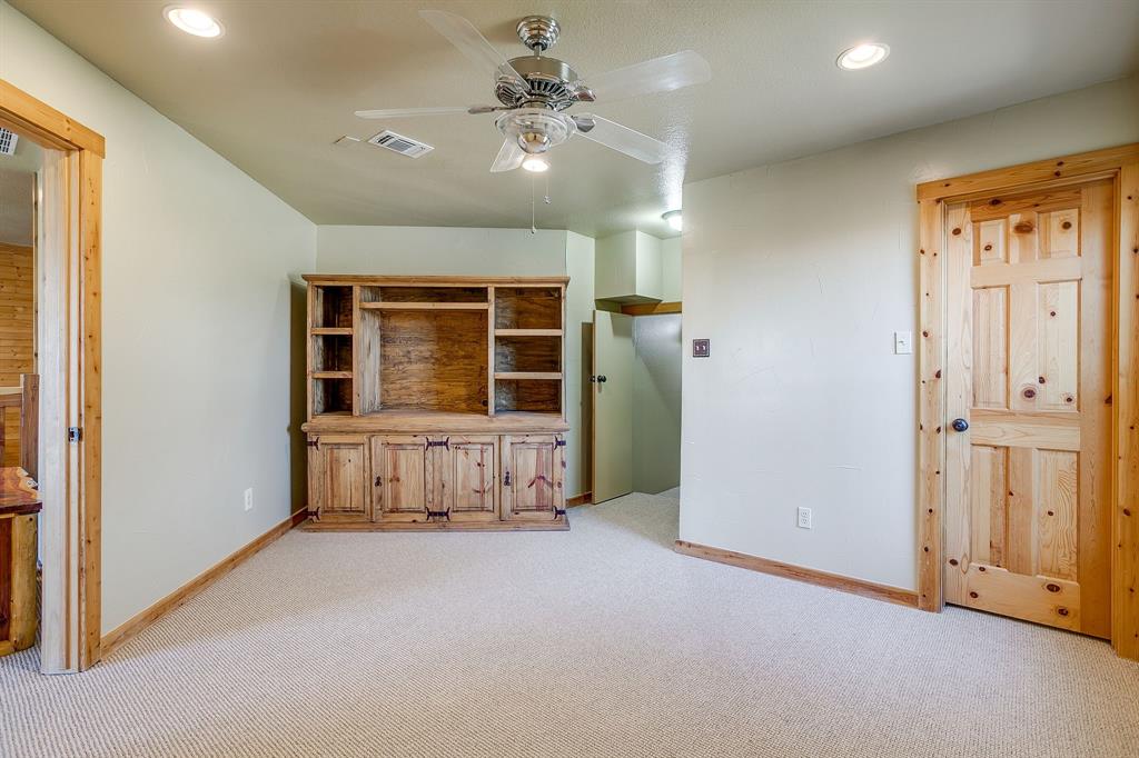 1791 Farm To Market Road 730 North Decatur, TX 76234 - Photo 29 of 40 an empty room with windows and closet