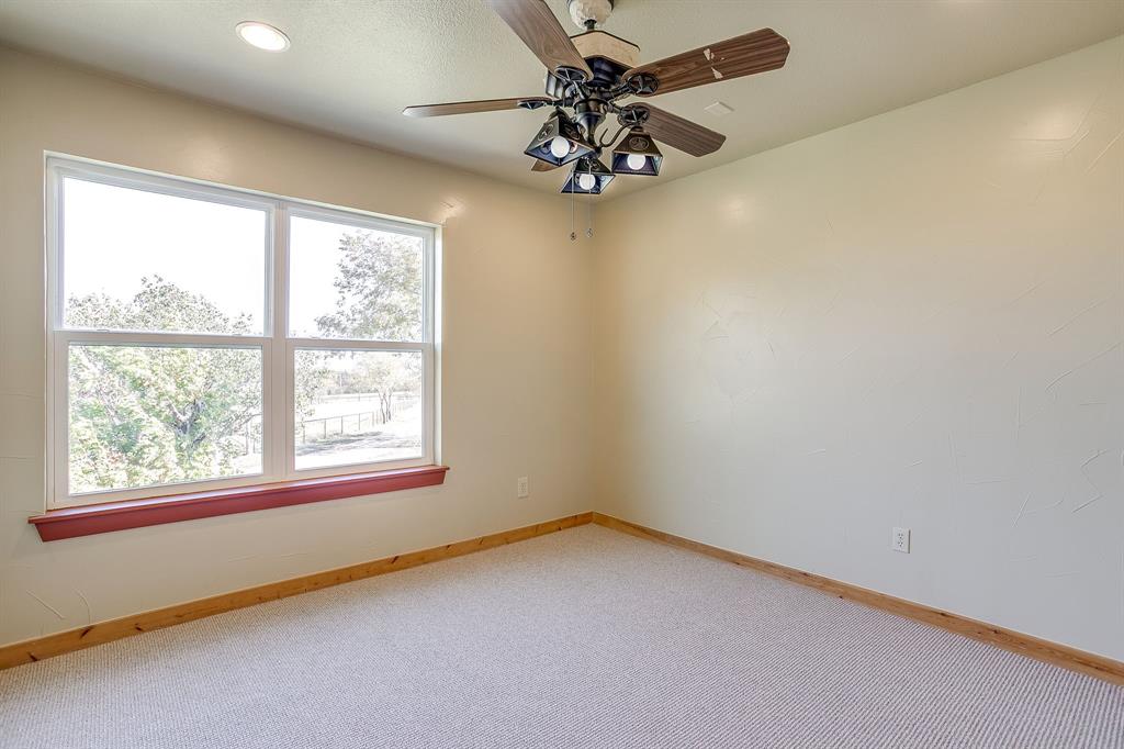 1791 Farm To Market Road 730 North Decatur, TX 76234 - Photo 34 of 40 an empty room with a window