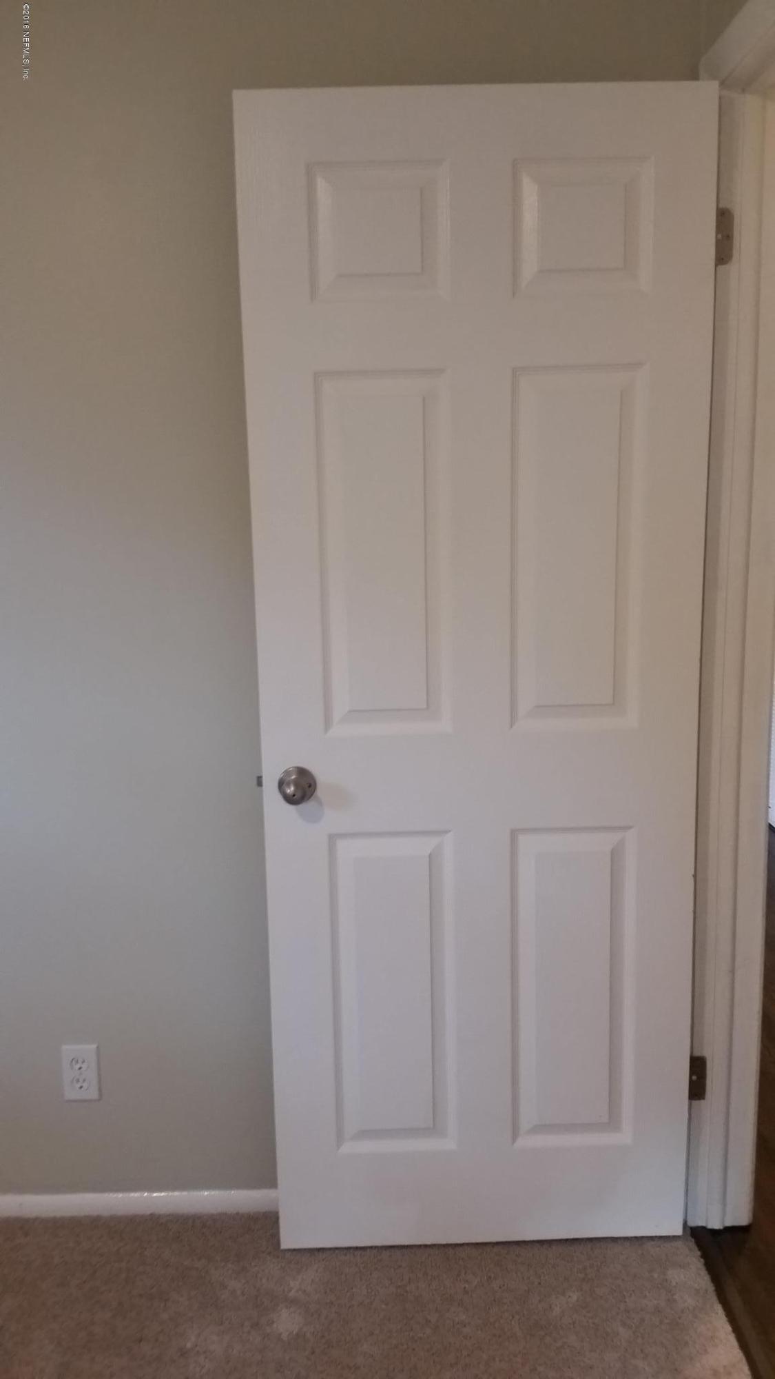 748 Vecuna Road Atlantic Beach, FL 32233 - Photo 26 of 33 a view of front door