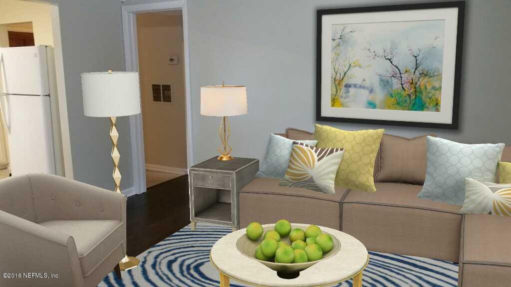 748 Vecuna Road Atlantic Beach, FL 32233 - Photo 4 of 33 a living room with furniture and a lamp
