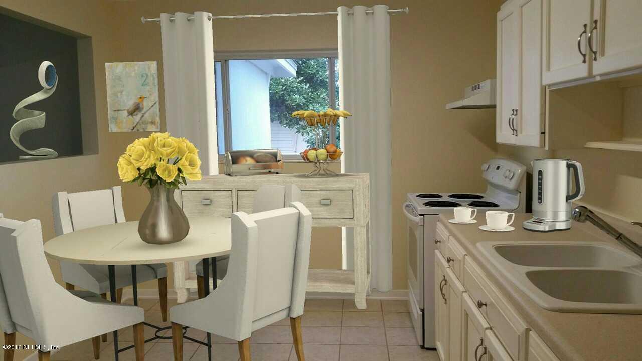 748 Vecuna Road Atlantic Beach, FL 32233 - Photo 8 of 33 a dining room with furniture and chandelier