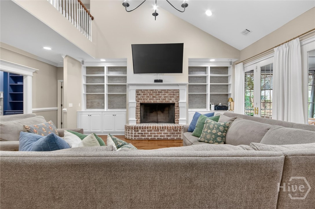 101 Red Bluff Run Rincon, GA 31326 - Photo 13 of 45 Built in bookshelves with hearth wood burning fireplace