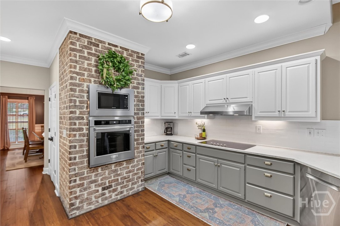 101 Red Bluff Run Rincon, GA 31326 - Photo 16 of 45 Savannah brick surrounding built in oven and microwave