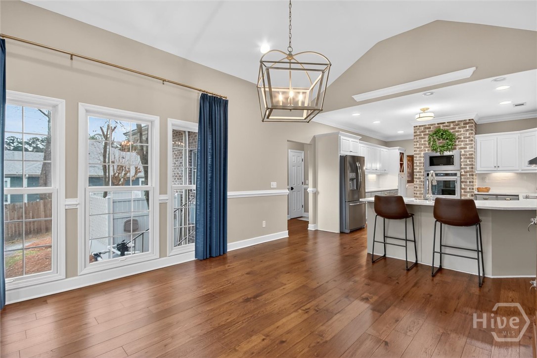 101 Red Bluff Run Rincon, GA 31326 - Photo 21 of 45 Breakfast has beautiful natural light with back yard and screened porch view