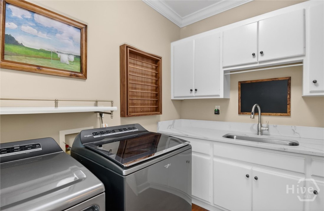101 Red Bluff Run Rincon, GA 31326 - Photo 27 of 45 Laundry room with quartz counter tops and perfect tidy storage cabinetry
