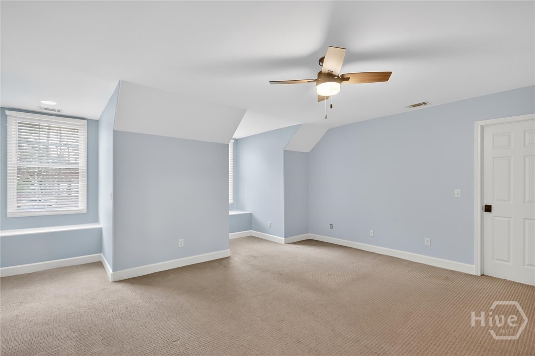 101 Red Bluff Run Rincon, GA 31326 - Photo 29 of 45 1st guest beroom with dual dormer window sitting areas