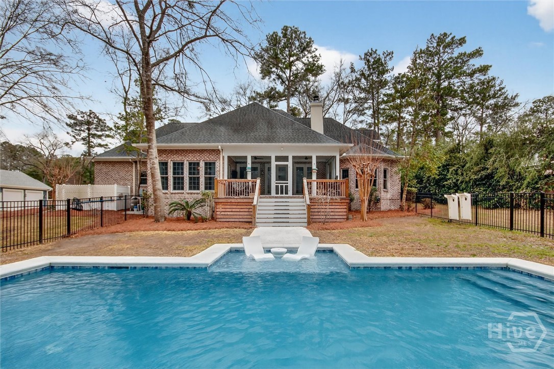 101 Red Bluff Run Rincon, GA 31326 - Photo 43 of 45 Cool deck edging gunite salt water pool with tanning ledge