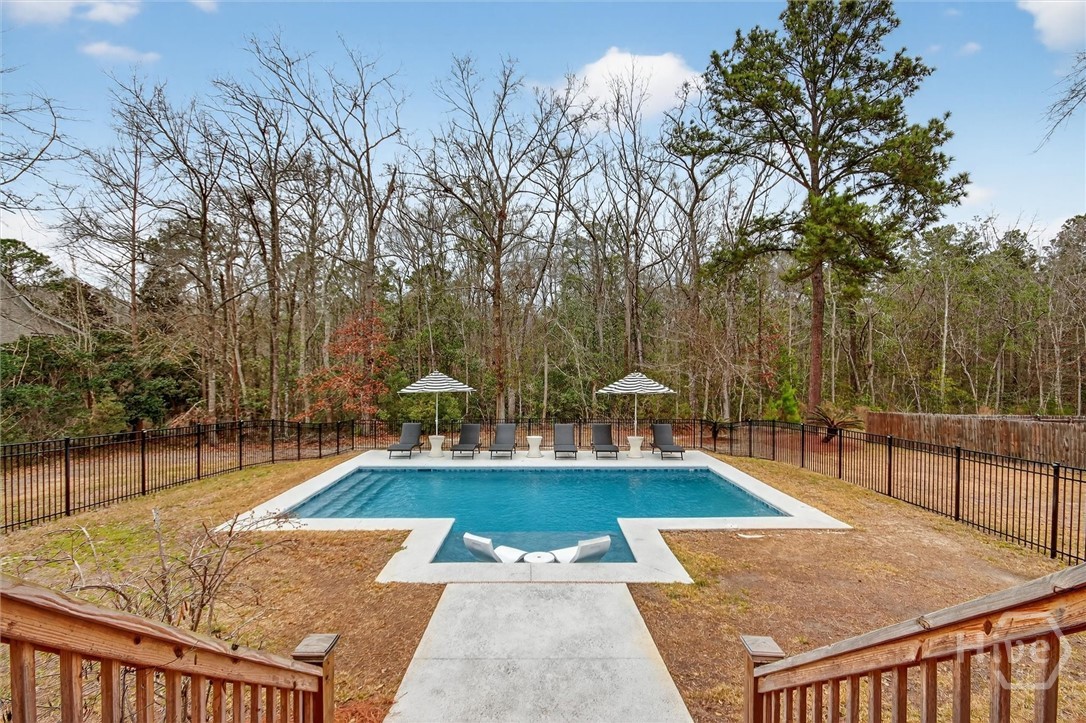 101 Red Bluff Run Rincon, GA 31326 - Photo 45 of 45 Private back yard with thick wooded coverage there is also a tex deck for outdoor grilling that is uncovered immediately after stepping out of screened porch