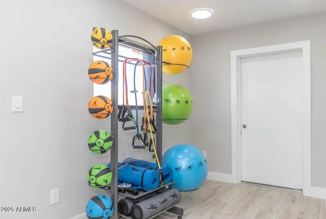 a room with toys and wooden floor