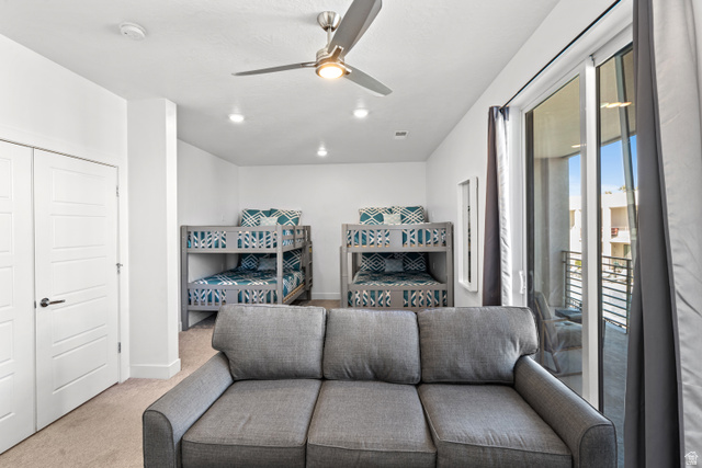 1122 South 1790th Street West, Unit 2 St. George, UT 84770 - Photo 17 of 37 Carpeted interior space featuring two built-in bunk bed structures, recessed lighting, and a modern ceiling fan