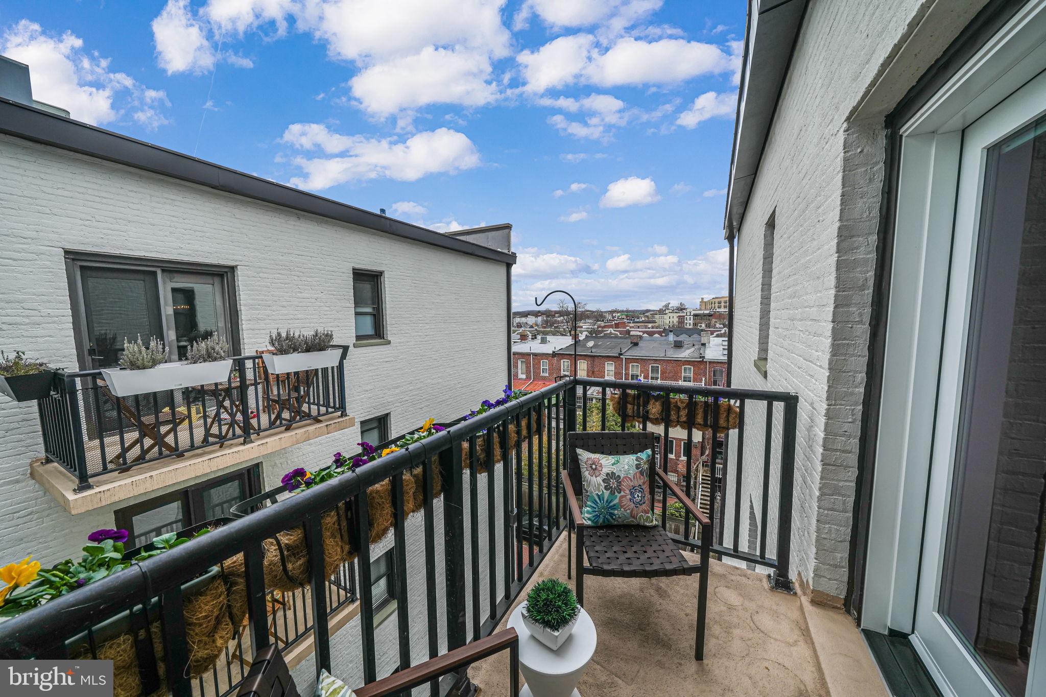 1613 Harvard Street Northwest, Unit 515 Washington, DC 20009 - Photo 12 of 53 a view of a balcony with furniture