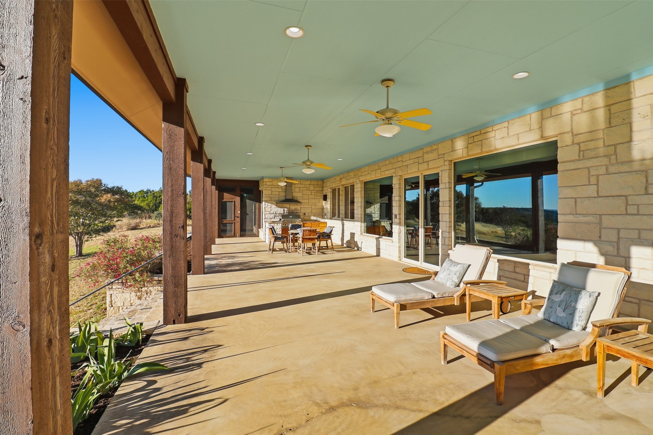 450 Threadgill Ranch Road Burnet, TX 78611 - Photo 19 of 33 a view of a patio with swimming pool table and chairs