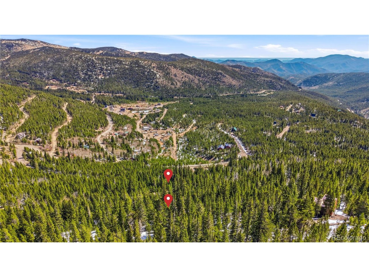 468 Hillside Road Idaho Springs, CO 80452 - Photo 3 of 12 a black and white photo of a lake