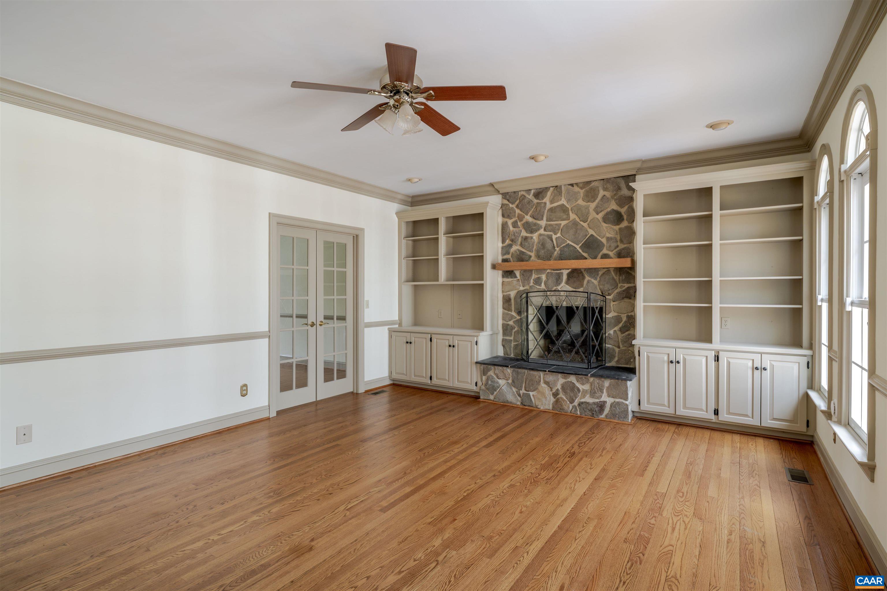 3125 Beau Mont Farm Road Charlottesville, VA 22901 - Photo 13 of 74 wooden floor in an empty room with a fireplace