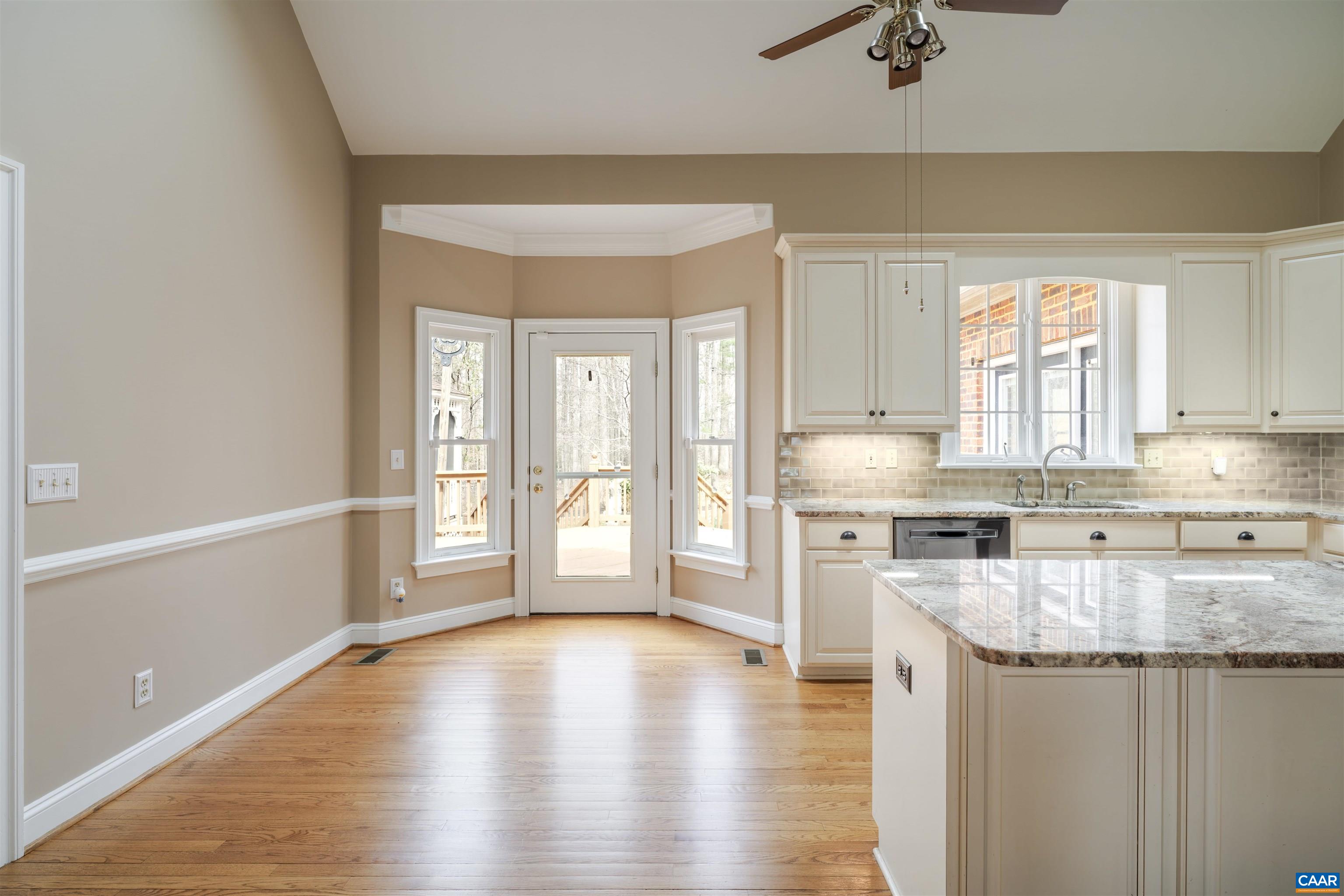 3125 Beau Mont Farm Road Charlottesville, VA 22901 - Photo 15 of 74 a kitchen with granite countertop a stove a sink and a refrigerator