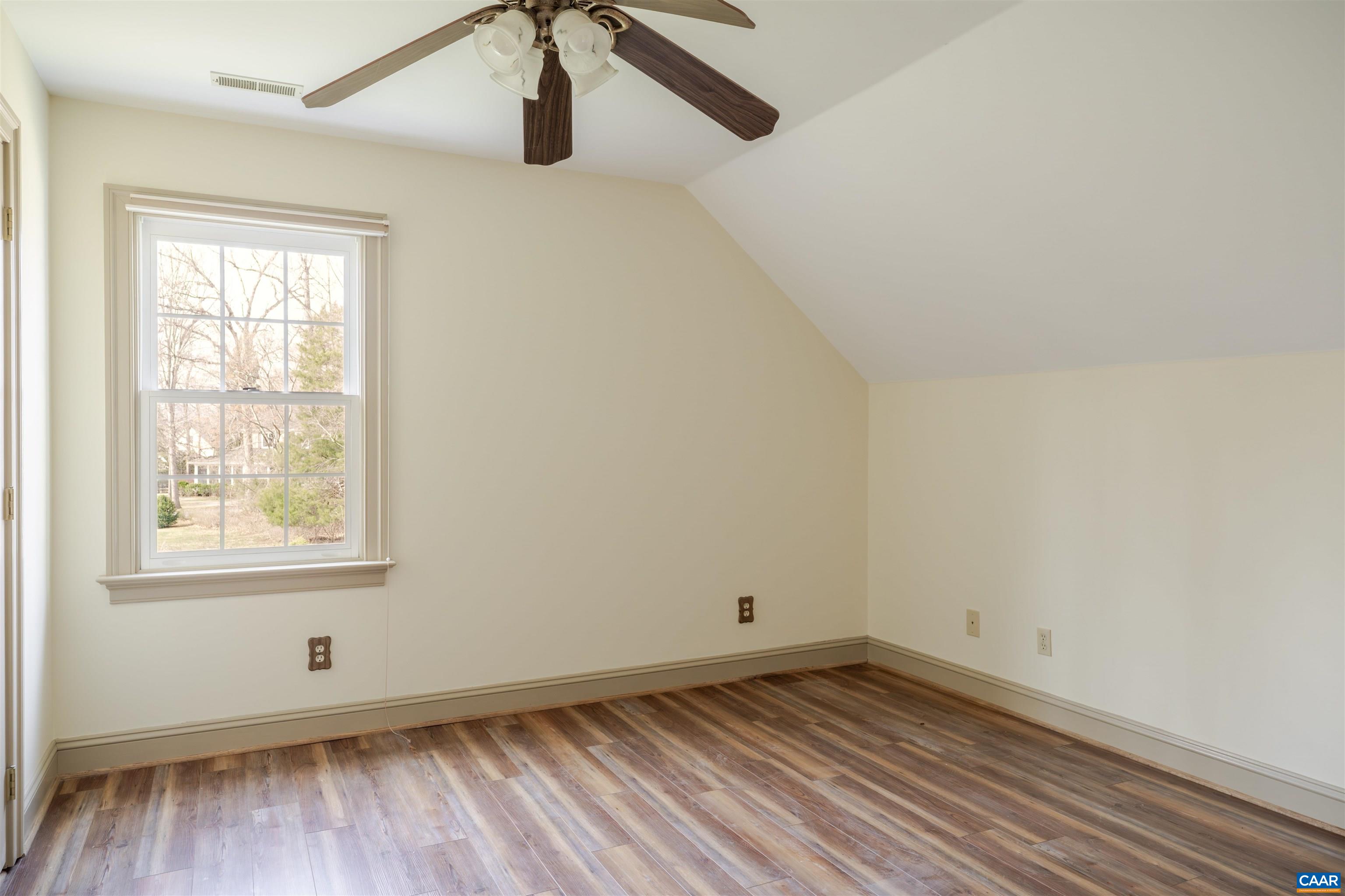 3125 Beau Mont Farm Road Charlottesville, VA 22901 - Photo 40 of 74 an empty room with wooden floor and windows