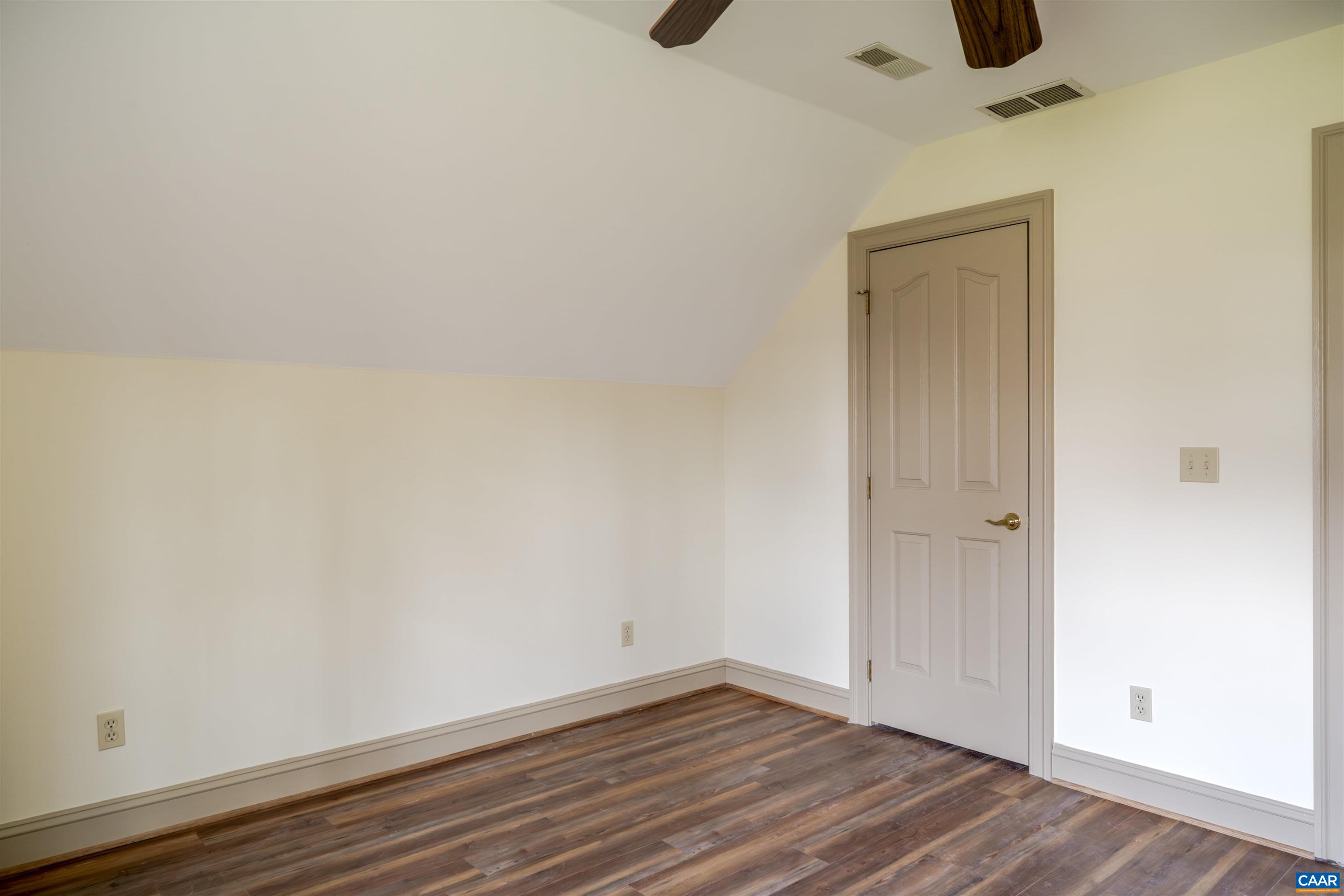 3125 Beau Mont Farm Road Charlottesville, VA 22901 - Photo 41 of 74 a view of an empty room and wooden floor