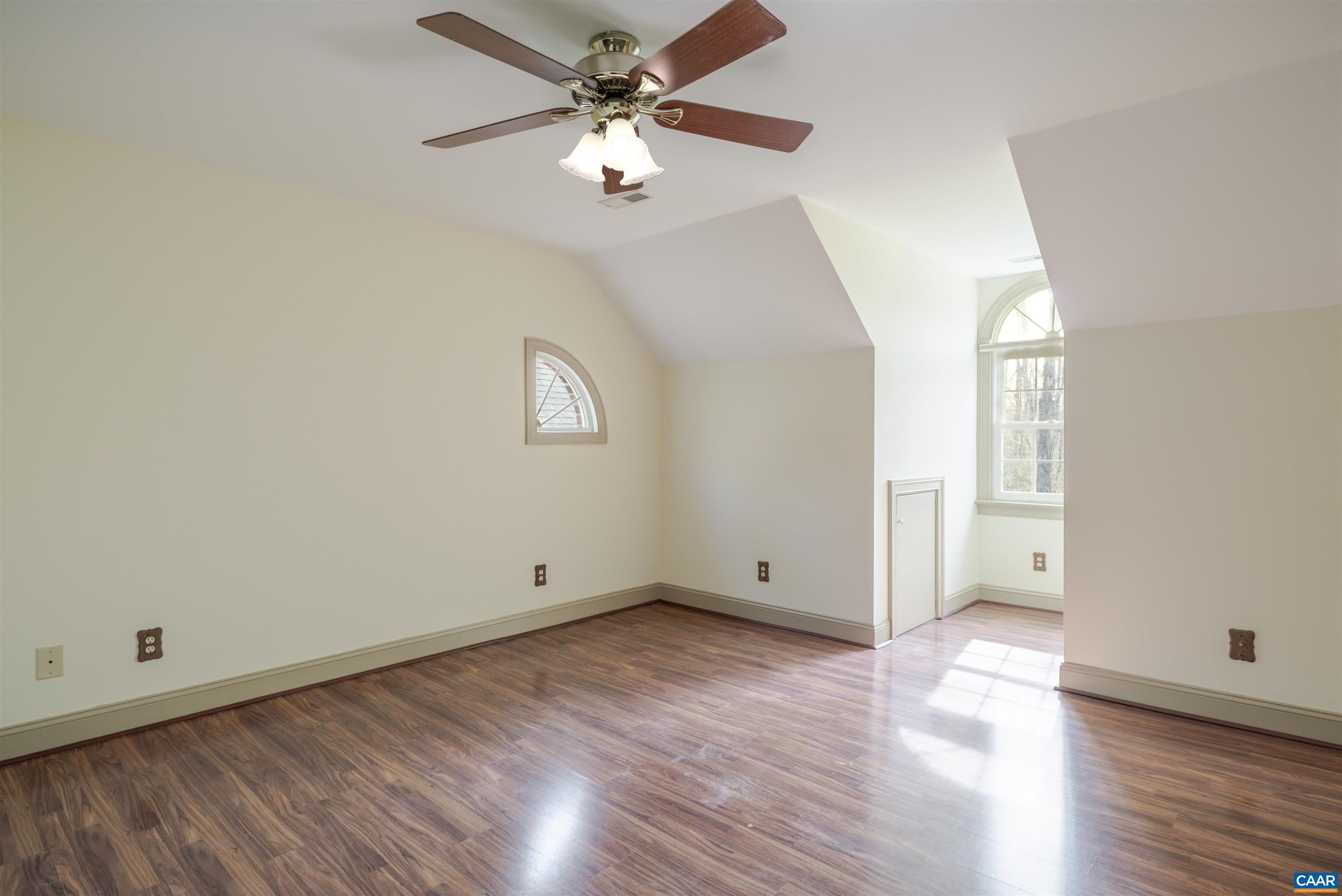 3125 Beau Mont Farm Road Charlottesville, VA 22901 - Photo 45 of 74 an empty room with wooden floor and windows