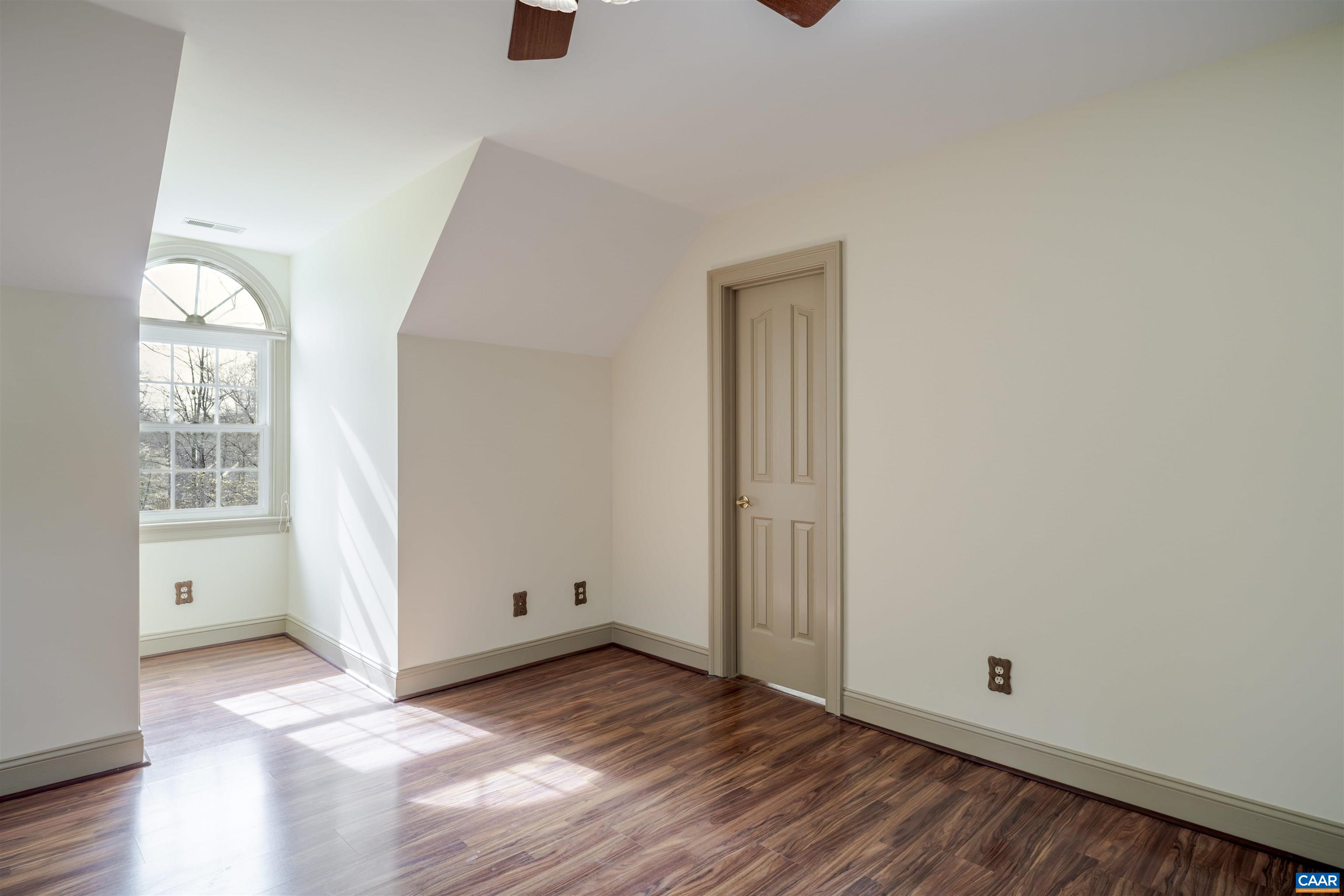 3125 Beau Mont Farm Road Charlottesville, VA 22901 - Photo 46 of 74 an empty room with wooden floor and windows
