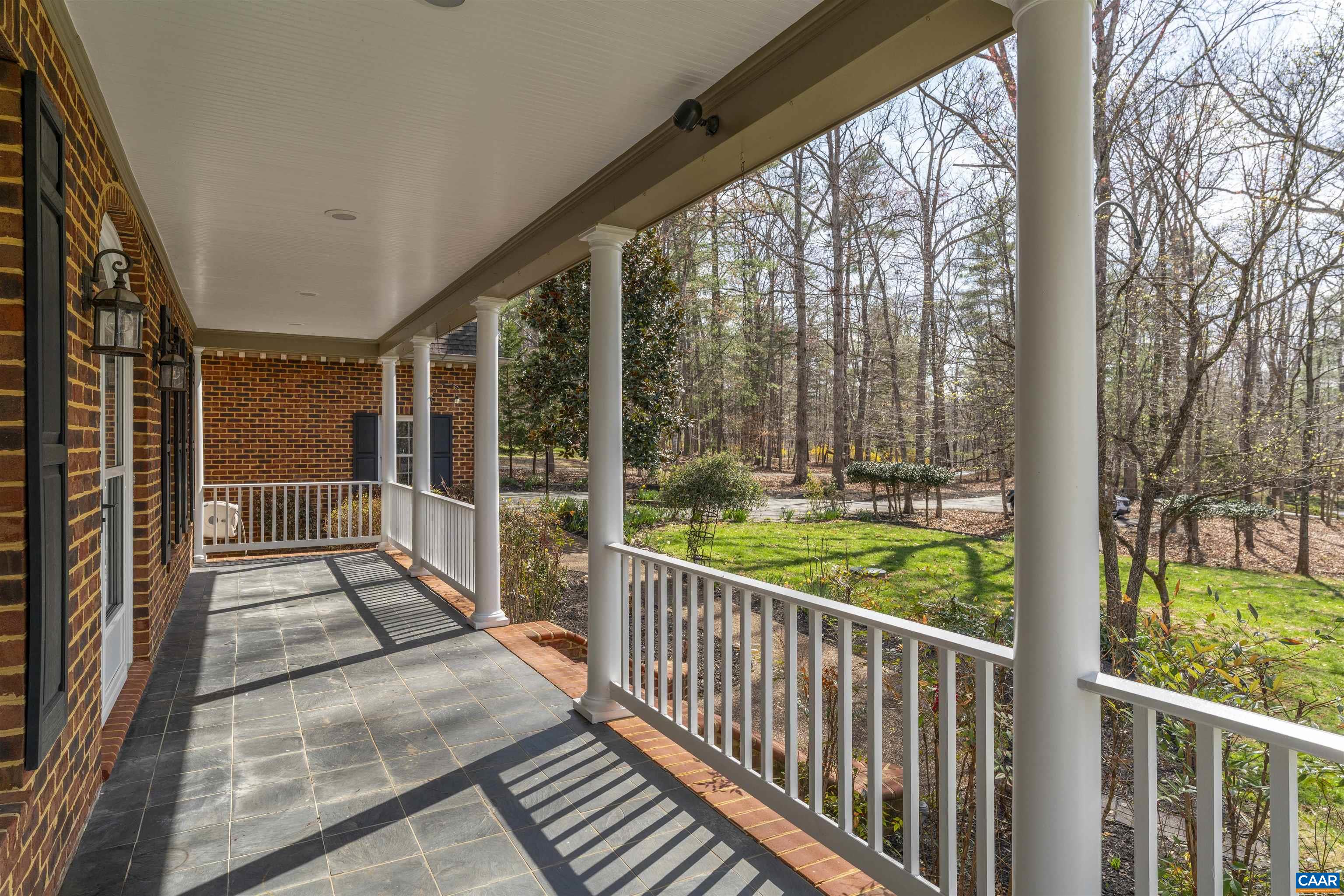 3125 Beau Mont Farm Road Charlottesville, VA 22901 - Photo 55 of 74 a view of a large room with wooden floor and fence