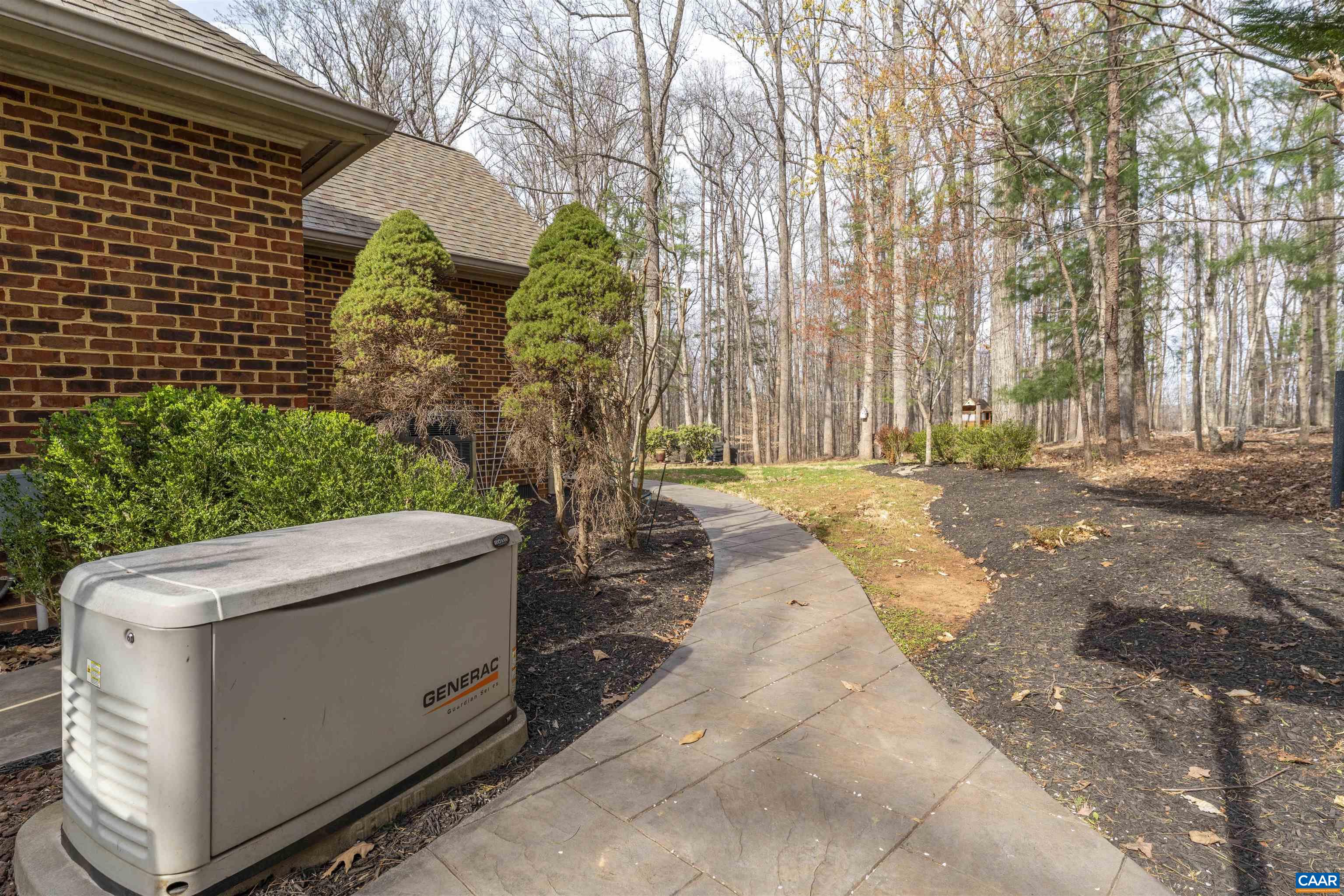 3125 Beau Mont Farm Road Charlottesville, VA 22901 - Photo 60 of 74 a pathway of a house with a yard and wooden fence