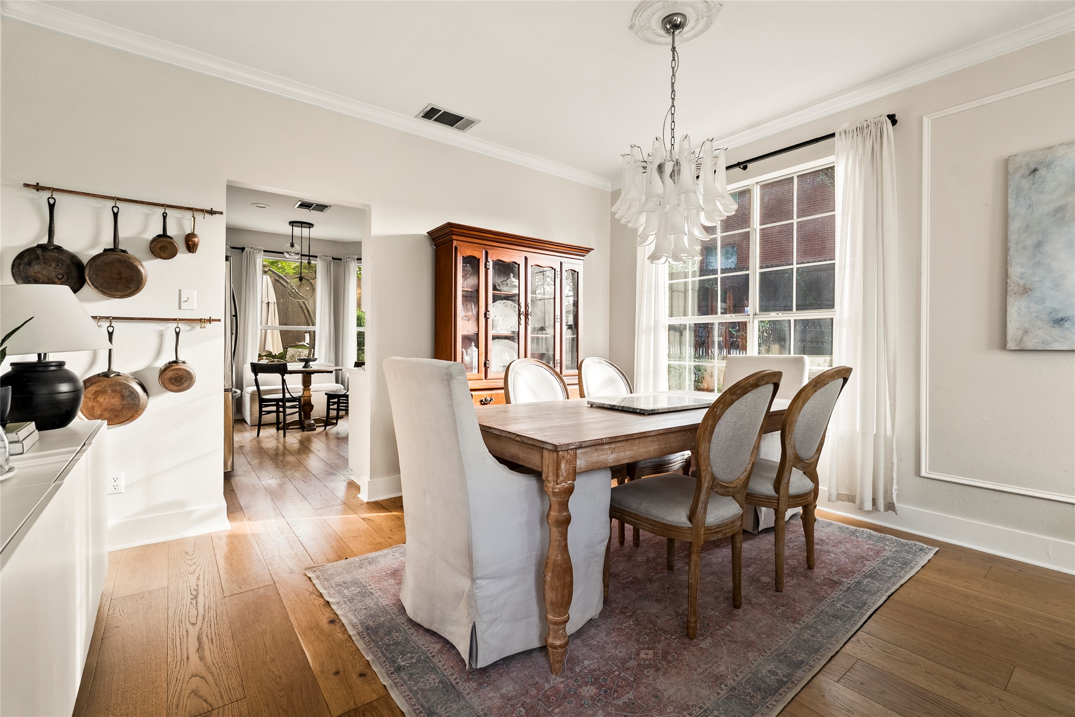 6803 Breezy Pass Austin, TX 78749 - Photo 17 of 40 a view of a dining room with furniture window and wooden floor