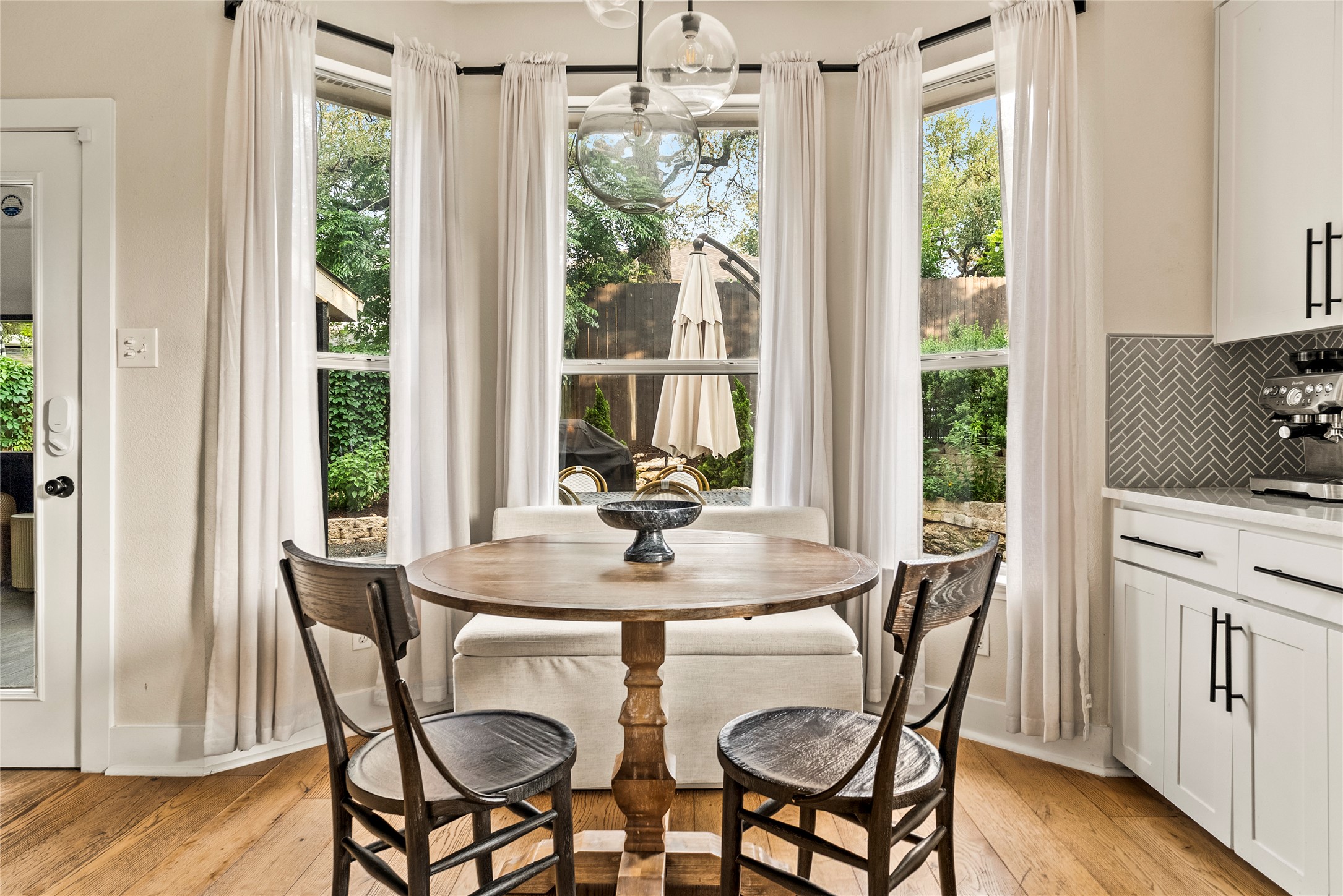 6803 Breezy Pass Austin, TX 78749 - Photo 21 of 40 a dining room with furniture window wooden floor