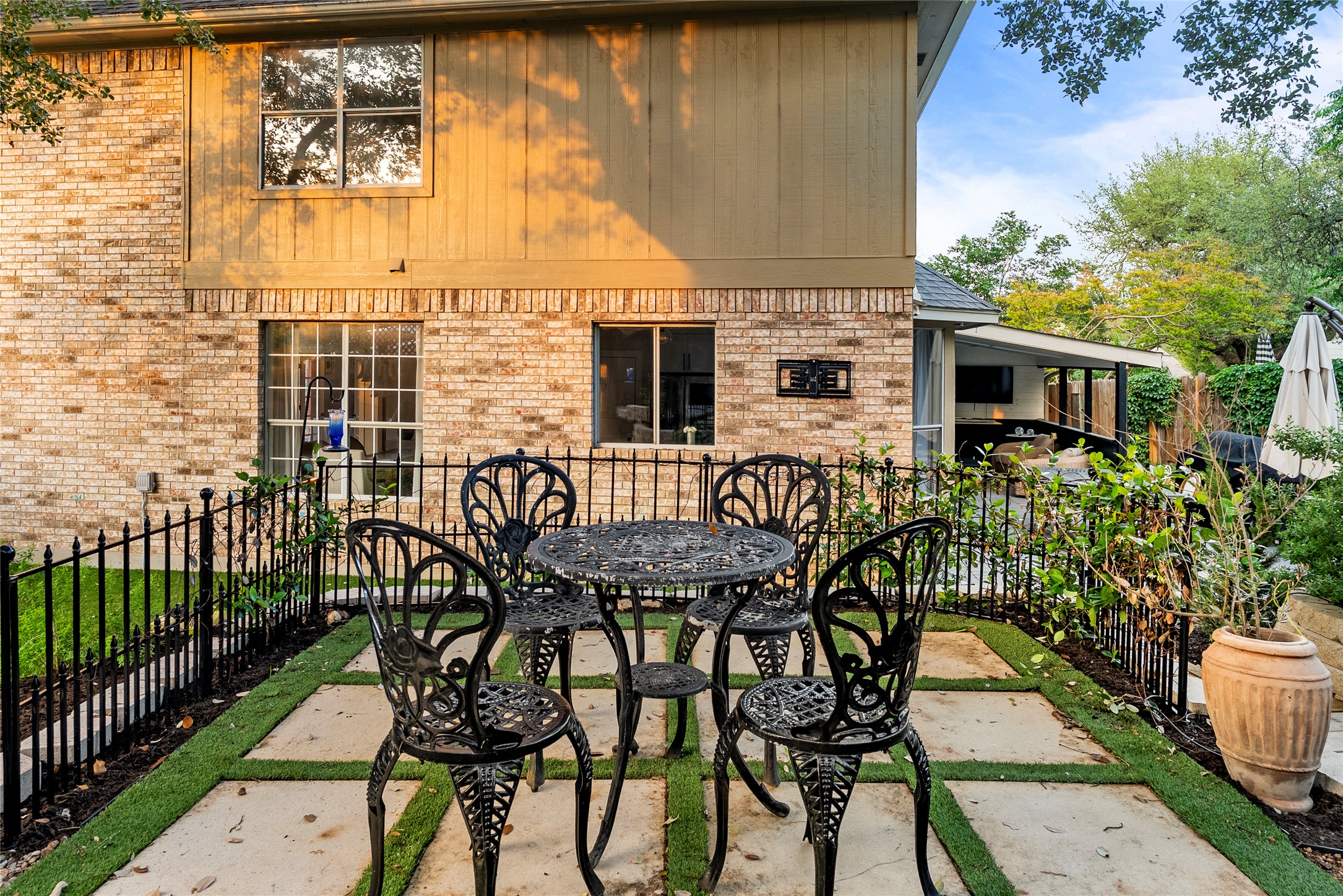 6803 Breezy Pass Austin, TX 78749 - Photo 39 of 40 a view of a patio with table and chairs and potted plants