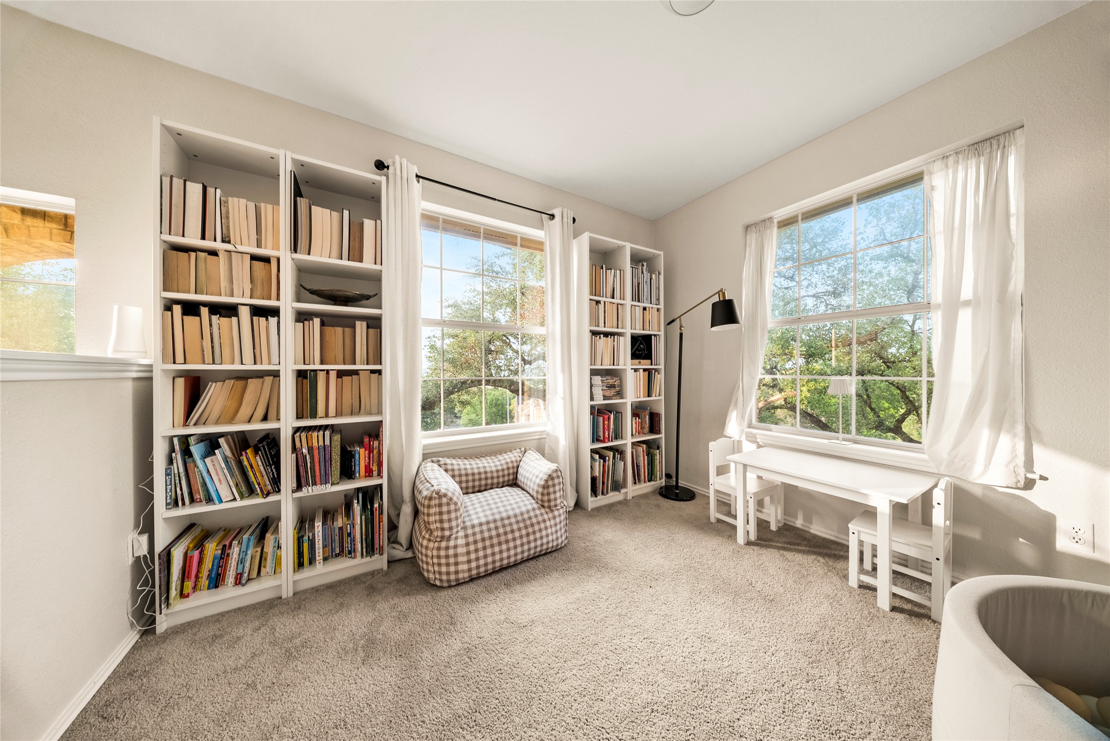 6803 Breezy Pass Austin, TX 78749 - Photo 6 of 40 a living room with furniture and a book shelf