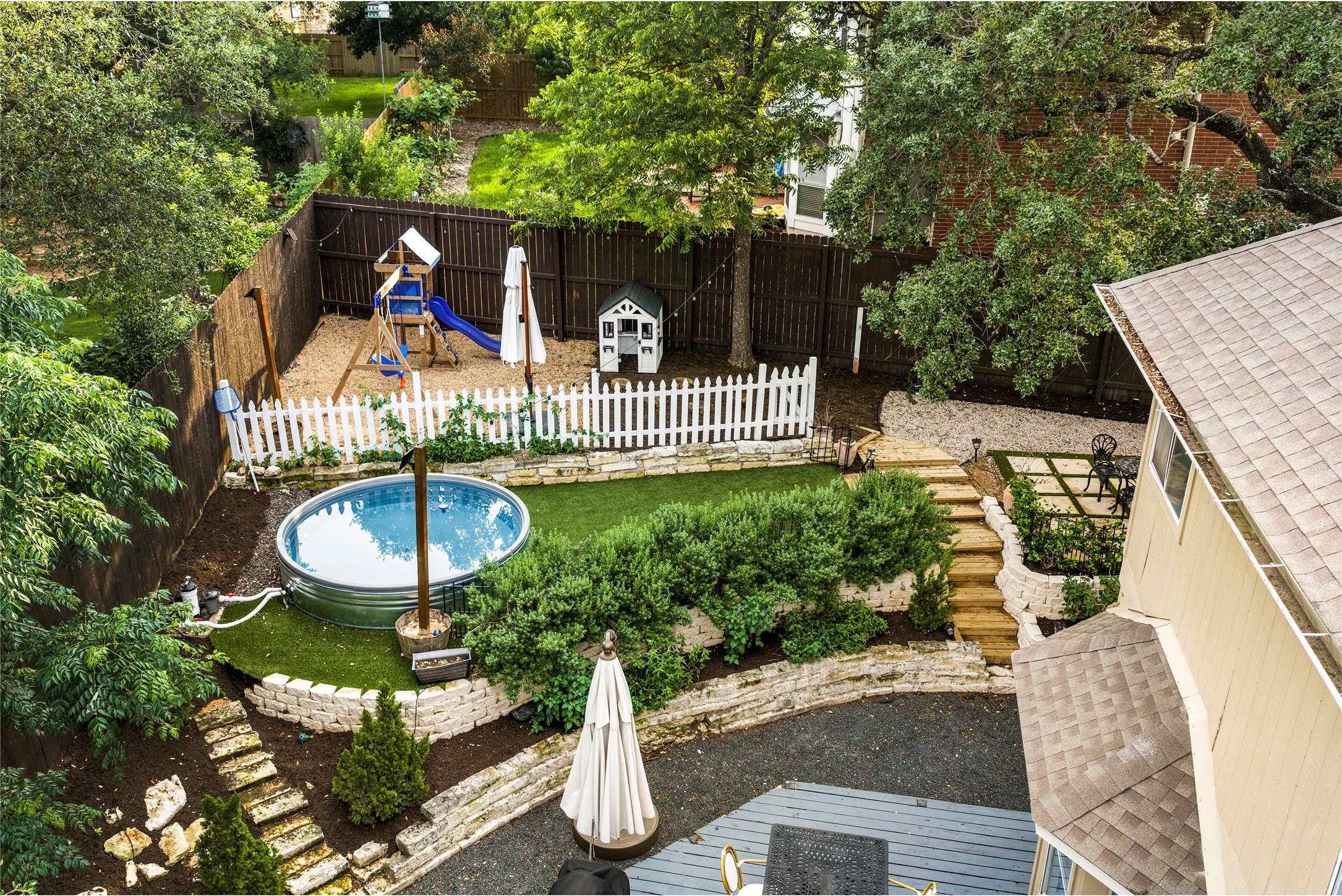 6803 Breezy Pass Austin, TX 78749 - Photo 8 of 40 a view of a swimming pool with a patio