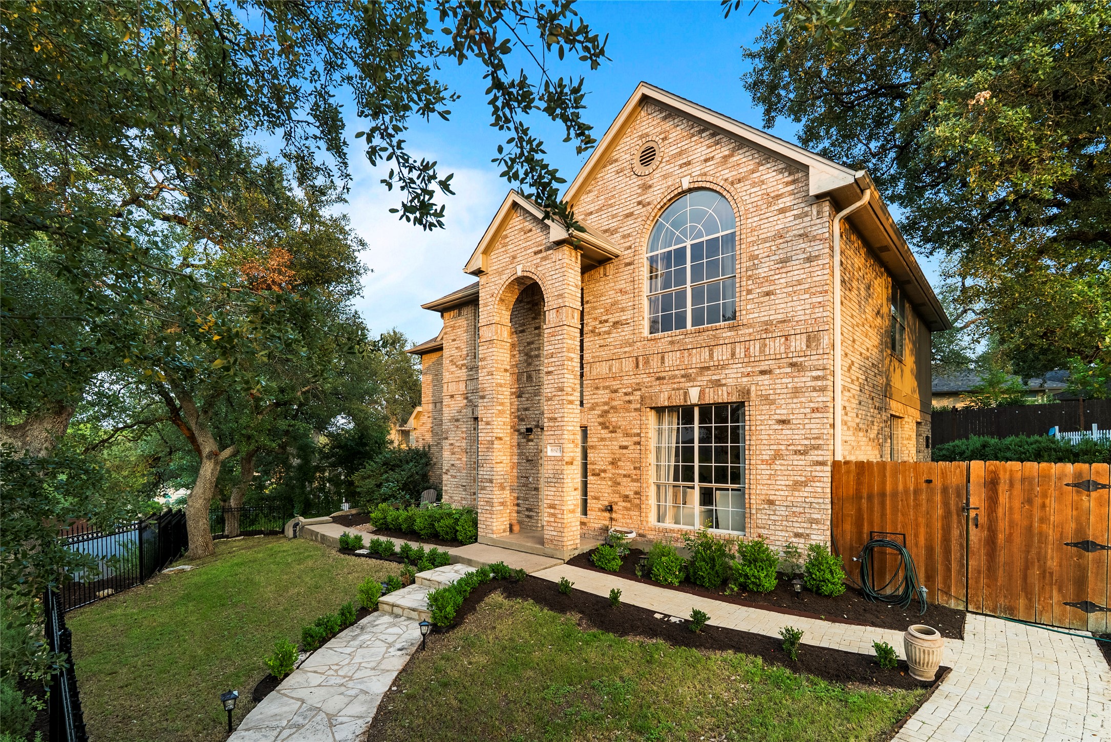 6803 Breezy Pass Austin, TX 78749 - Photo 10 of 40 front view of a house with a yard