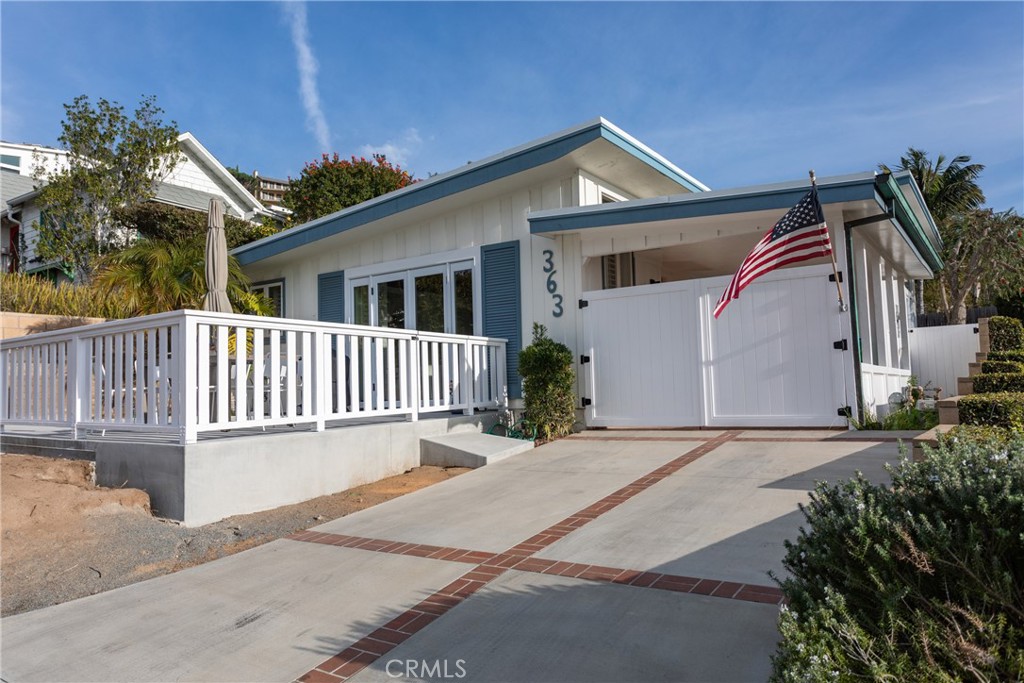 363 Ruby Street Laguna Beach, CA 92651 - Photo 23 of 25 a front view of a house with a yard