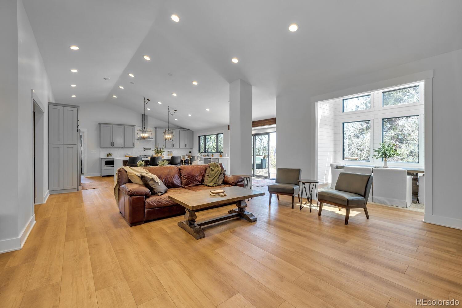 22398 Blue Jay Road Morrison, CO 80465 - Photo 12 of 39 a living room with furniture and a large window