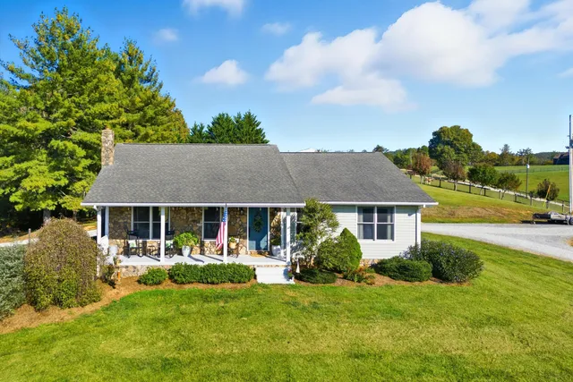 front view of a house with a yard