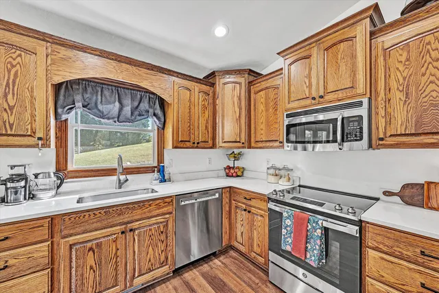 a utility room with sink dryer and washer