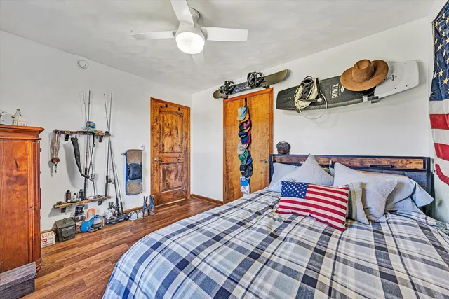 a view of walk in closet with clothes