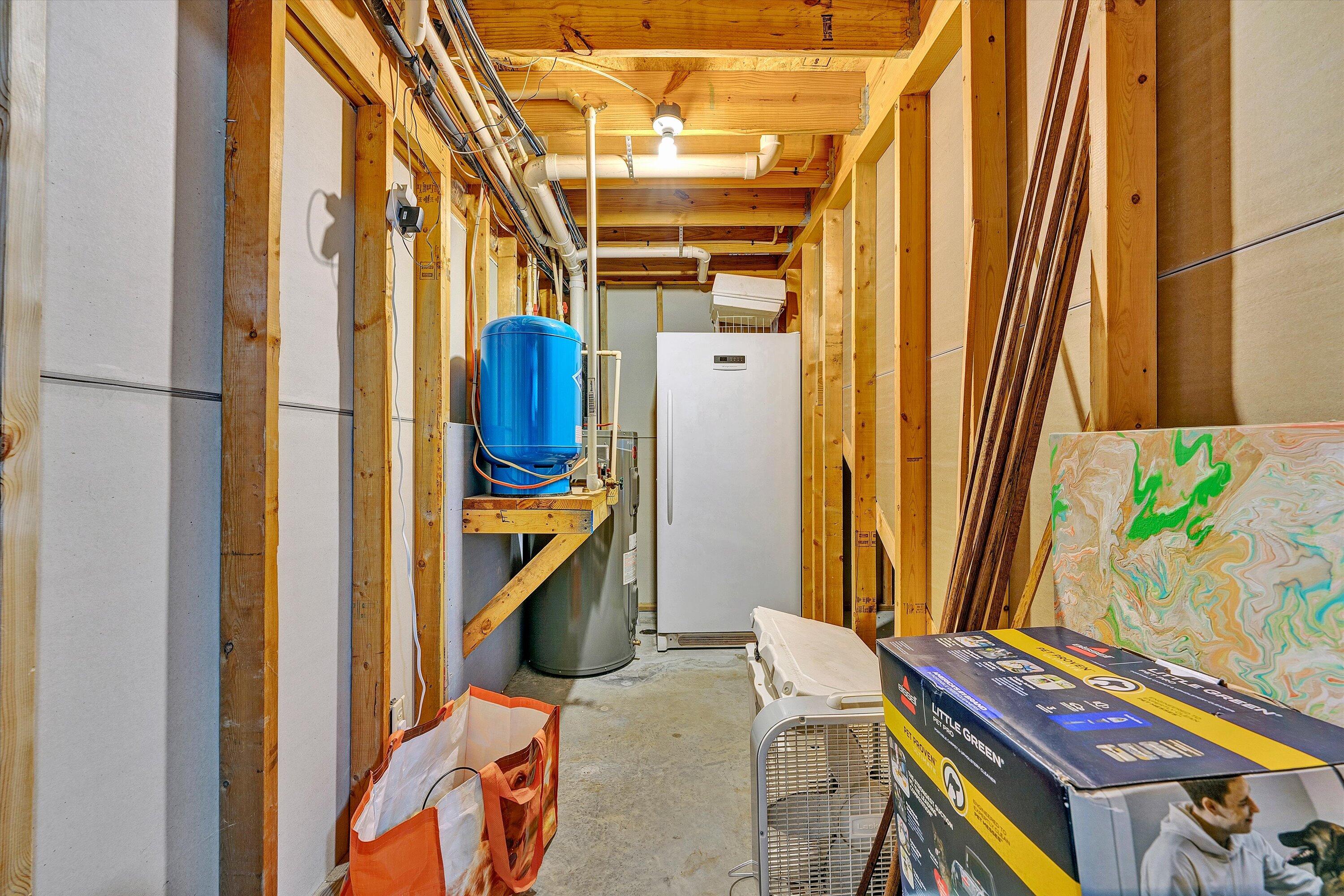 99 Spruce Lane Callaway, VA 24067 - Photo 47 of 66 a bedroom with a bed next to a window