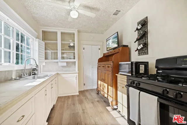 a view of an outdoor space with lounge chair