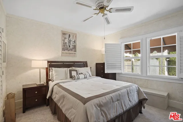 a work room with furniture and windows