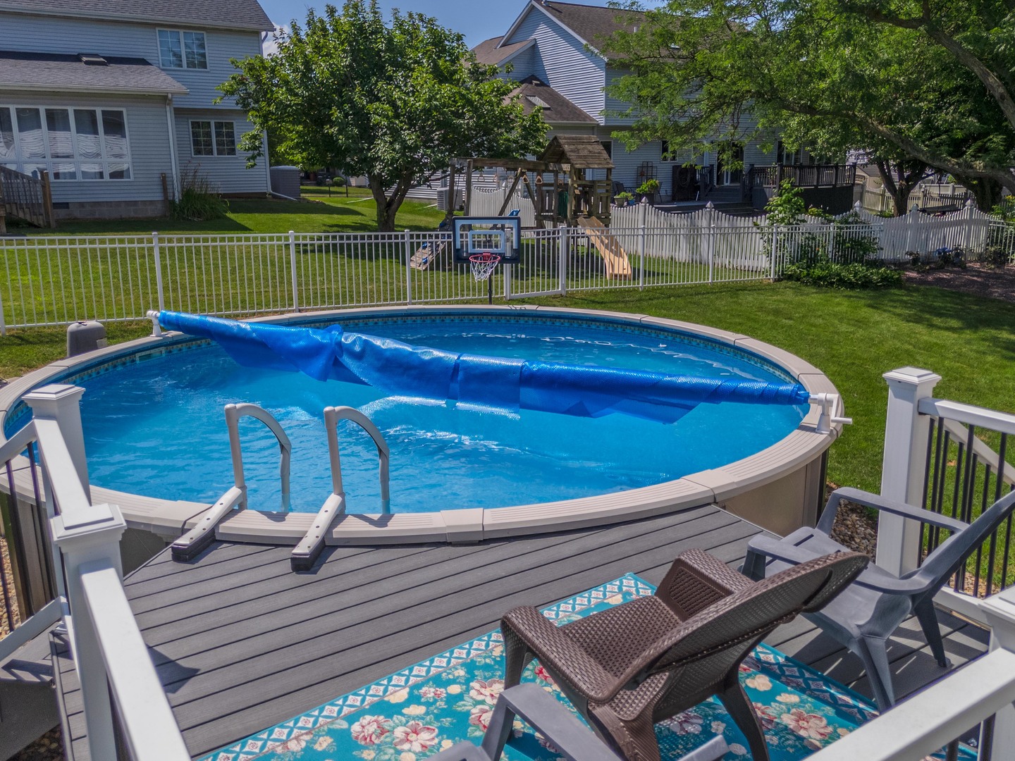 2605 Park Ridge Road Bloomington, IL 61704 - Photo 12 of 69 a view of a chairs and table on the deck