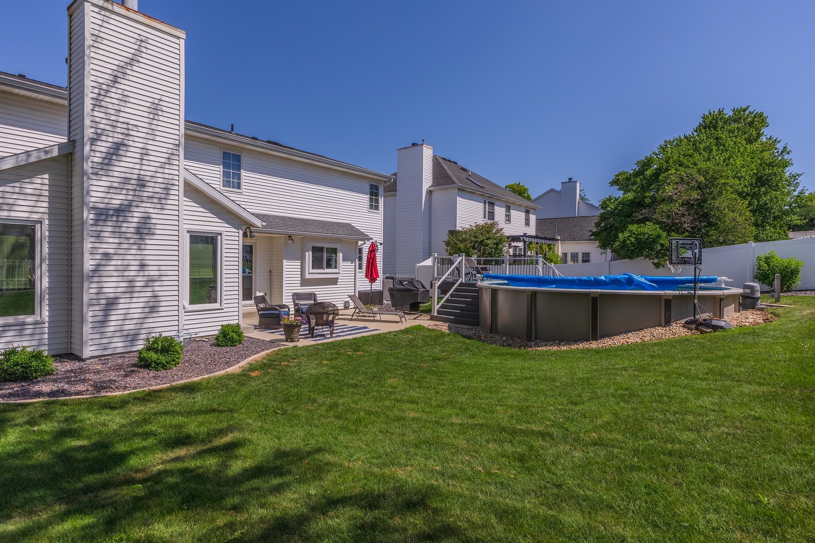 2605 Park Ridge Road Bloomington, IL 61704 - Photo 27 of 69 a view of a house with backyard and sitting area