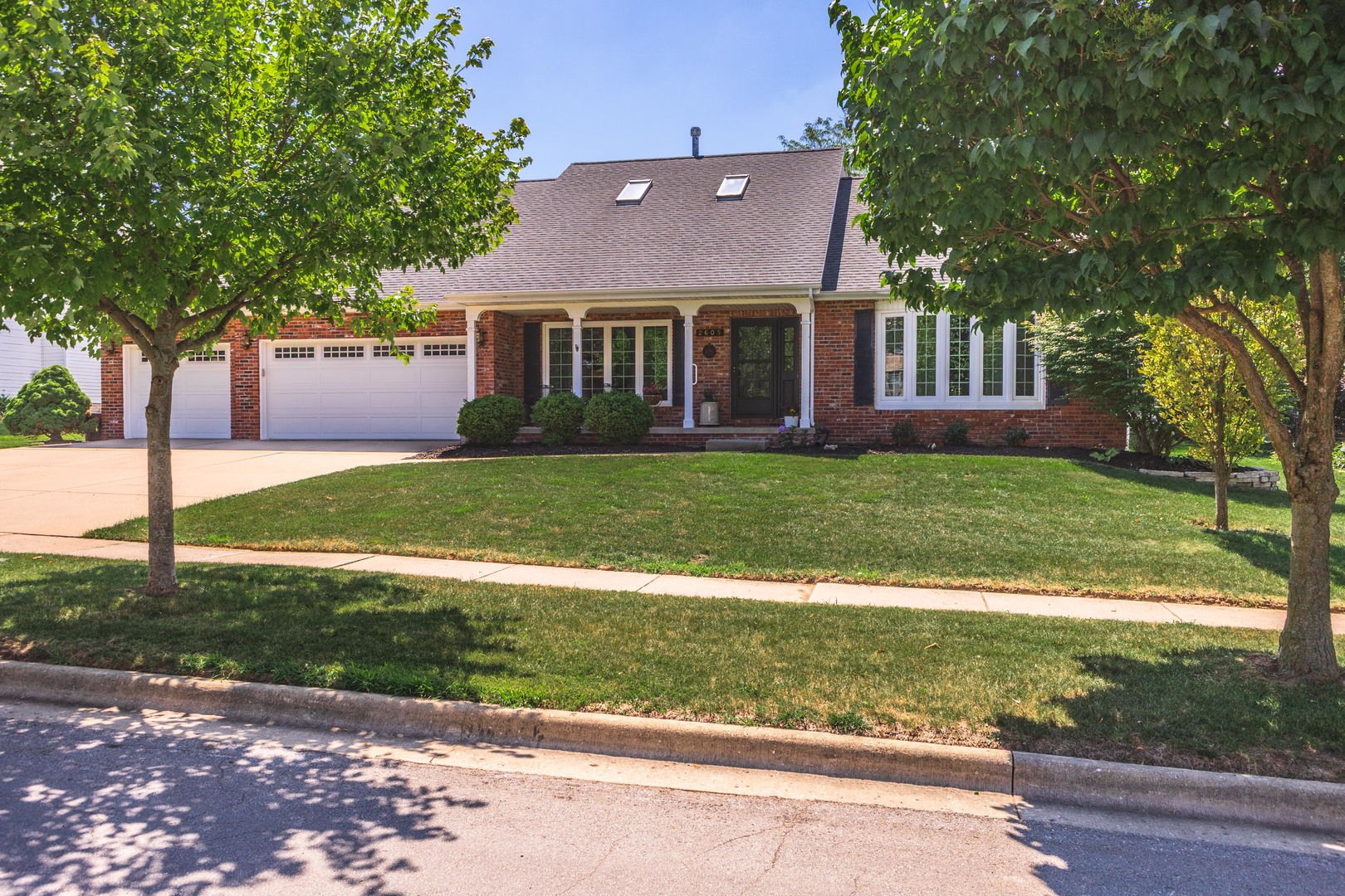 2605 Park Ridge Road Bloomington, IL 61704 - Photo 32 of 69 a aerial view of a house with a yard