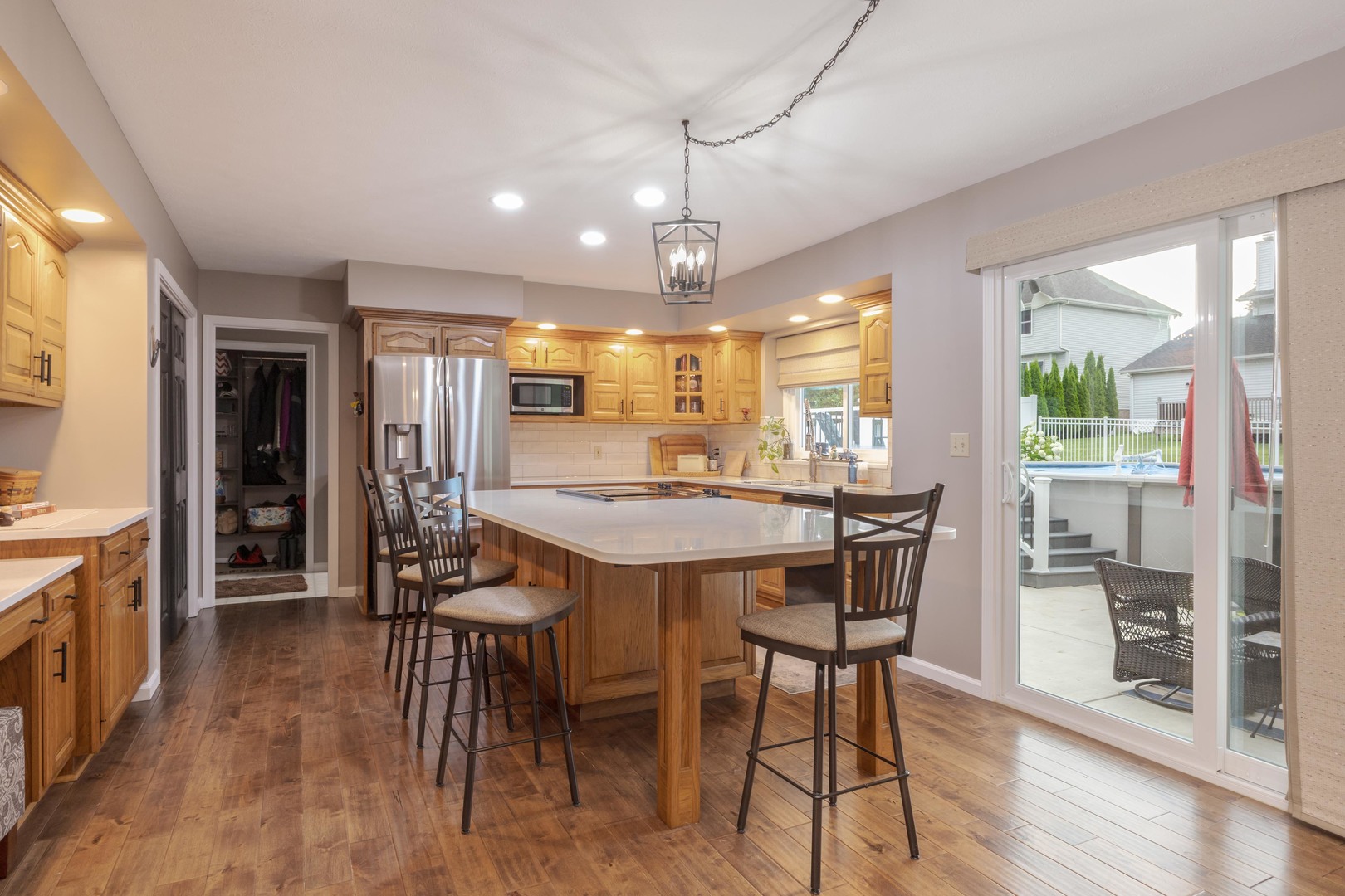 2605 Park Ridge Road Bloomington, IL 61704 - Photo 41 of 69 a view of a dining room with furniture window and wooden floor