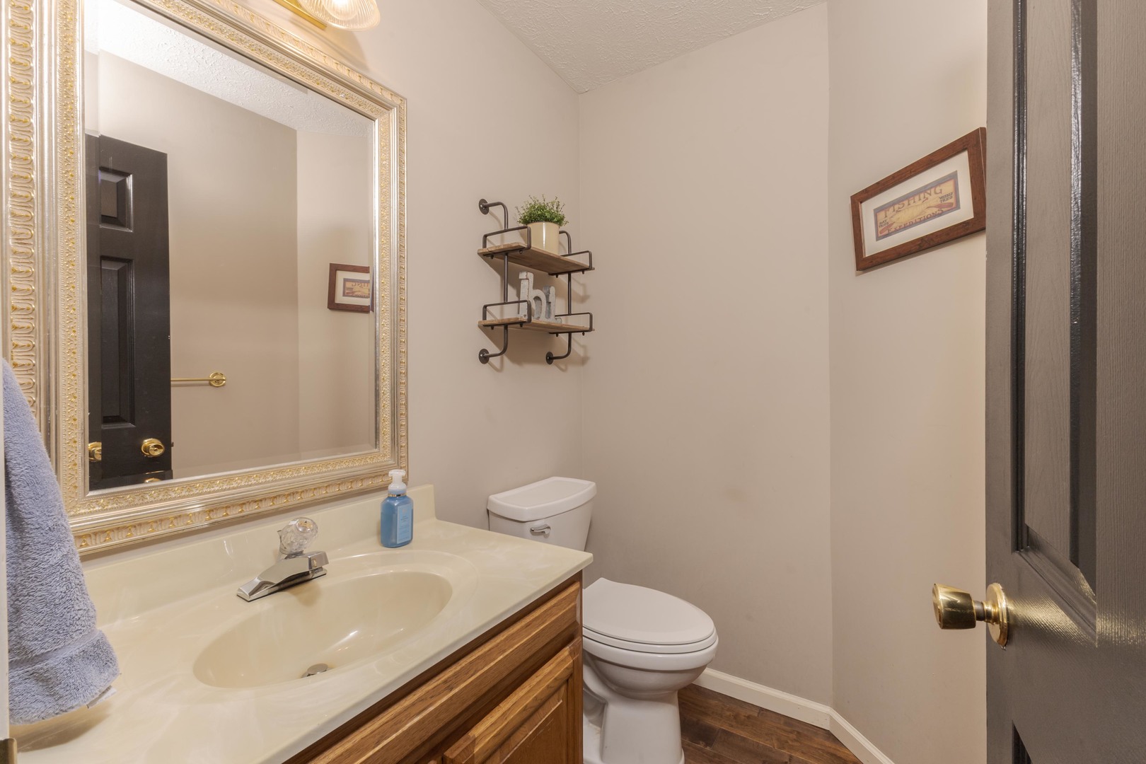 2605 Park Ridge Road Bloomington, IL 61704 - Photo 54 of 69 a bathroom with a sink toilet and mirror