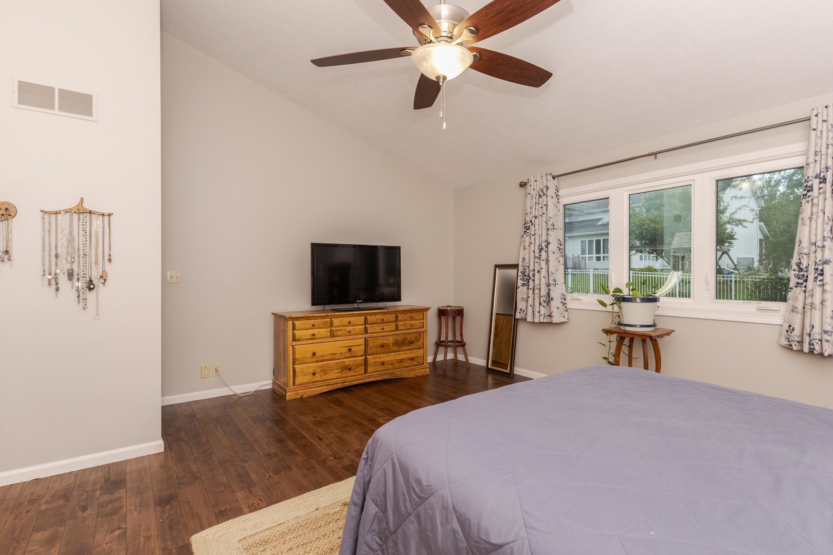 2605 Park Ridge Road Bloomington, IL 61704 - Photo 56 of 69 a bedroom with a bed and a large window