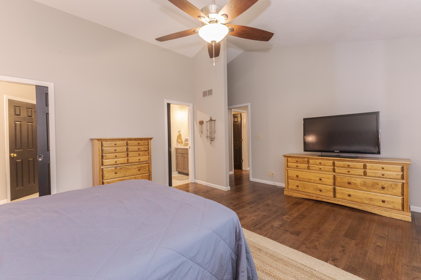 2605 Park Ridge Road Bloomington, IL 61704 - Photo 57 of 69 a bedroom with a bed and a flat screen tv