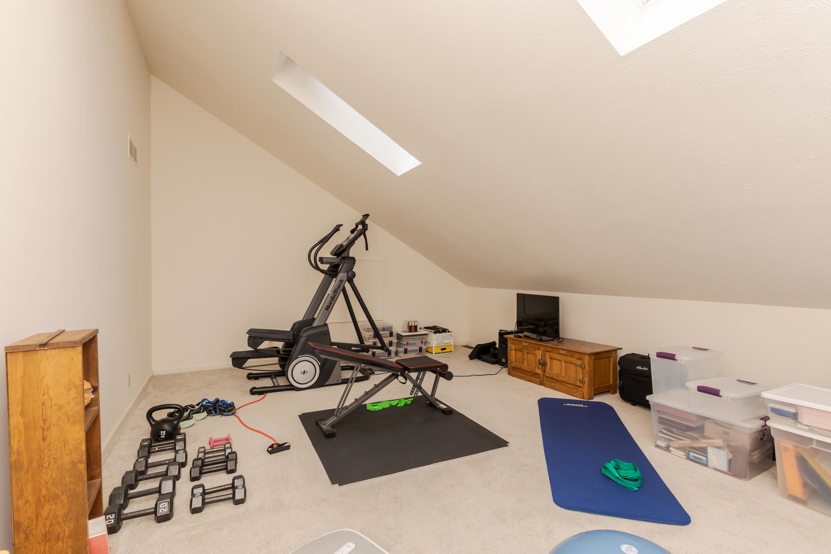 2605 Park Ridge Road Bloomington, IL 61704 - Photo 63 of 69 a room with gym equipment and view of living room