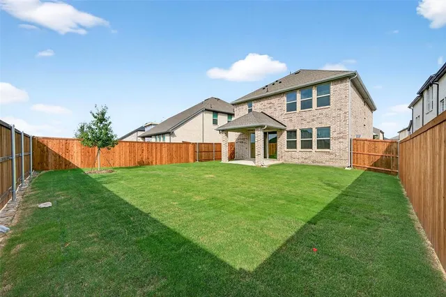 a house view with a garden space