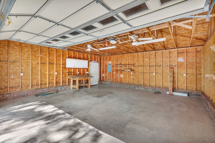 106 Pikes Ridge Anderson, SC 29626 - Photo 29 of 41 An oversized unfinished garage features concrete floors and plenty of space for projects.